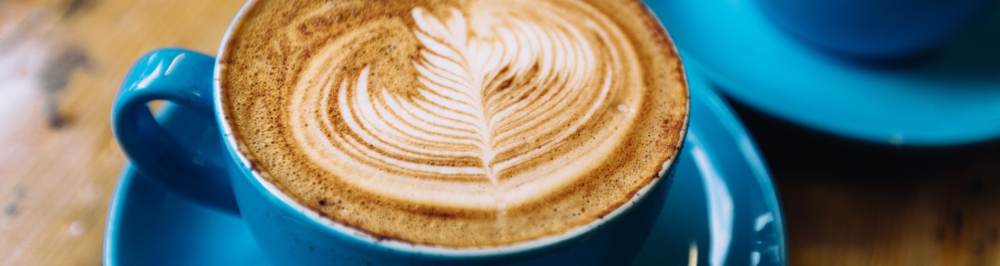 Two Lattes in Blue Coffee Mugs